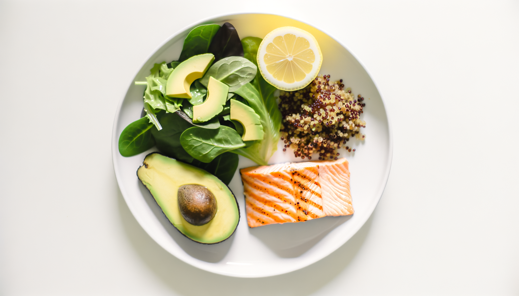 Healthy intermittent fasting meal with salmon, quinoa, and avocado